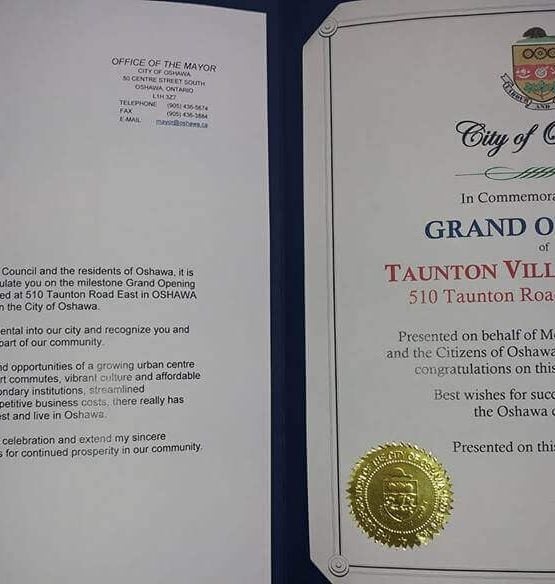 Taunton Village Dental presented with the city of Oshawa grand opening ceremony certificate